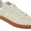 A close-up view of a beige Lacoste sneaker. Produktbild-Vorschau