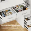 An open drawer of a white vanity table filled with makeup and jewelry. Produktbild-Vorschau