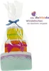 A diaper cake gift, wrapped in clear plastic, with a blue ribbon and bow. Produktbild-Vorschau