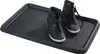 A black shoe tray with a textured surface and a pair of black high-top sneakers on it. Náhled obrázku produktu