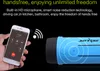 A hand holding a smartphone connected wirelessly to a blue Bluetooth speaker. Produktbild-Vorschau