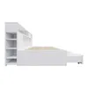 A side view of a white bed frame with built-in shelving and drawers. Produktbild-Vorschau