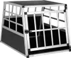 A dog transport box made of aluminum and black panels, shown from the front-left. Náhled obrázku produktu
