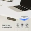 A close-up view of a white desk with a laptop and a control panel for an adjustable desk. Produktbild-Vorschau