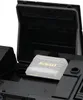 A close-up view of the interior of a black storage case, showing a transparent battery pack with the DeWALT logo. Produktbild-Vorschau