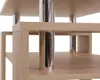 A close-up view of a modern coffee table with wooden shelves and chrome legs. Voir les images du produit