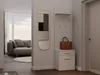 Hallway entrance with a mirror, coat rack with a shelf, and a cabinet. A sofa is visible in the background through an opening. Produktbild-Vorschau