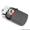 A gray pouch with a red zipper detail, containing white earbuds and two white smartphones, is shown against a white background. Produktbild-Vorschau