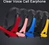 A row of colorful computer headsets with microphones. Produktbild-Vorschau