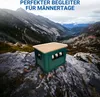 A green crate with a wooden lid sits on a rocky surface in a mountainous landscape. Anteprima dell’immagine prodotto