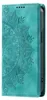 A teal flip case for a Xiaomi Redmi 13 5G/4G phone with a mandala embossed pattern. Produktbild-Vorschau