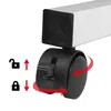 Close-up of a caster wheel on a white table leg, with icons indicating lock/unlock and up/down movement. Produktbild-Vorschau