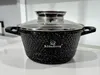 A black pot with a speckled pattern and a glass lid sits on a white surface. Náhľad obrázku produktu