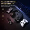 Gaming accessories including a headset, keyboard, and controllers are arranged on a dark surface. Produktbild-Vorschau