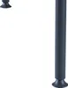 Close-up of the base of a table leg and a foot. Náhled obrázku produktu