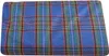 A close-up, top-down view of a folded picnic blanket with a blue, green, red, and black plaid pattern. Produktbild-Vorschau