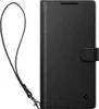 A black wallet-style phone case with a strap, shown closed. Produktbild-Vorschau