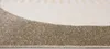 Close-up view of a rug's texture and edge. Produktbild-Vorschau