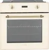 A front view of a cream-colored electric built-in oven with brass-colored accents. Náhled obrázku produktu