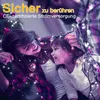 A mother and daughter are happily interacting with Christmas lights. Produktbild-Vorschau