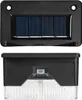 A product shot of two solar-powered garden lights, one showing the top with solar panels and the other showing the bottom with the light. Podgląd zdjęcia produktu