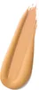A swatch of liquid foundation is shown against a white background. Náhled obrázku produktu