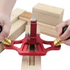 Hands using a red woodworking hand plane tool on pieces of wood. Produktbild-Vorschau
