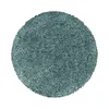 A round, shaggy rug in a teal color against a white background. Produktbild-Vorschau