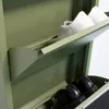 A close-up view of a green metal shoe cabinet with two shelves, each holding a pair of shoes. Anteprima dell’immagine prodotto