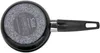 The underside of a black Silit frying pan with a textured gray base and a black handle. Anteprima dell’immagine prodotto