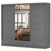 A gray sliding door wardrobe with a mirrored center panel, reflecting a bedroom interior. Voir les images du produit