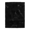 A black rug with a textured surface.