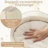 A hand is shown pressing into a soft, plush surface of a cat bed, with text overlays highlighting product features. Podgląd zdjęcia produktu