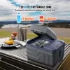 A portable cooler filled with bottles is placed on a table outdoors with a scenic background of mountains and water. Voir les images du produit