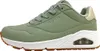 A side view of a green Skechers sneaker with a white sole and brown outsole. Produktbild-Vorschau