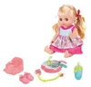 A baby doll with accessories laid out on a white background. Produktbild-Vorschau