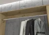 Close-up view of a wardrobe interior with clothes hanging on a rail. Produktbild-Vorschau