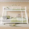 A white metal bunk bed with green and gray bedding, set in a child's bedroom. Voir les images du produit