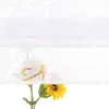 A close-up of a sunflower against a white background with a subtle floral pattern. Produktbild-Vorschau