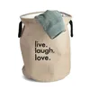 A laundry basket with a towel inside. Podgląd zdjęcia produktu