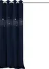 A navy blue curtain with silver glittery star pattern hanging from a curtain rod. Podgląd zdjęcia produktu