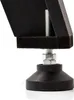 A close-up view of the adjustable foot of a table, likely a foosball table, showing the screw mechanism and rubber base. Náhled obrázku produktu