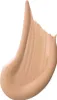A swatch of liquid foundation is shown against a white background. Náhled obrázku produktu