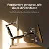 A dual monitor desk mount is shown on a desk, with arrows indicating its range of motion. Produktbild-Vorschau