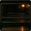The interior of an oven with a wire rack. Anteprima dell’immagine prodotto