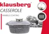 A Klausberg marble coating casserole with tomatoes and basil in the background, along with marketing icons. Voir les images du produit