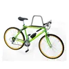 A green bicycle is mounted on a gray and black wall mount. Produktbild-Vorschau