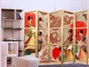 A room divider with Japanese-inspired artwork is placed next to a shelving unit. Produktbild-Vorschau