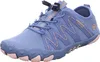 A single blue and pink athletic shoe is shown against a white background. Podgląd zdjęcia produktu