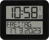 A digital clock displaying the time, day of the week, and date. Náhled obrázku produktu